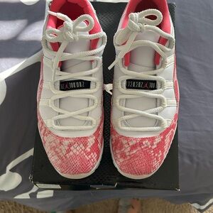 Pink and white Jordan sneakers